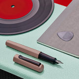 Whether you're writing the perfect novel, penning a valentine to your sweetheart, or jotting down the notes to a new tune, HEXO will help you bring your creativity to life!

Hexagonal barrel and cap made of anodized aluminum. Cap, with a metal clip pulls off and posts on the back end while writing. With or without the cap, the pen has a balanced weight. The ergonomically shaped grip zone allows for comfortable writing and is suitable for right and left-handed users.
