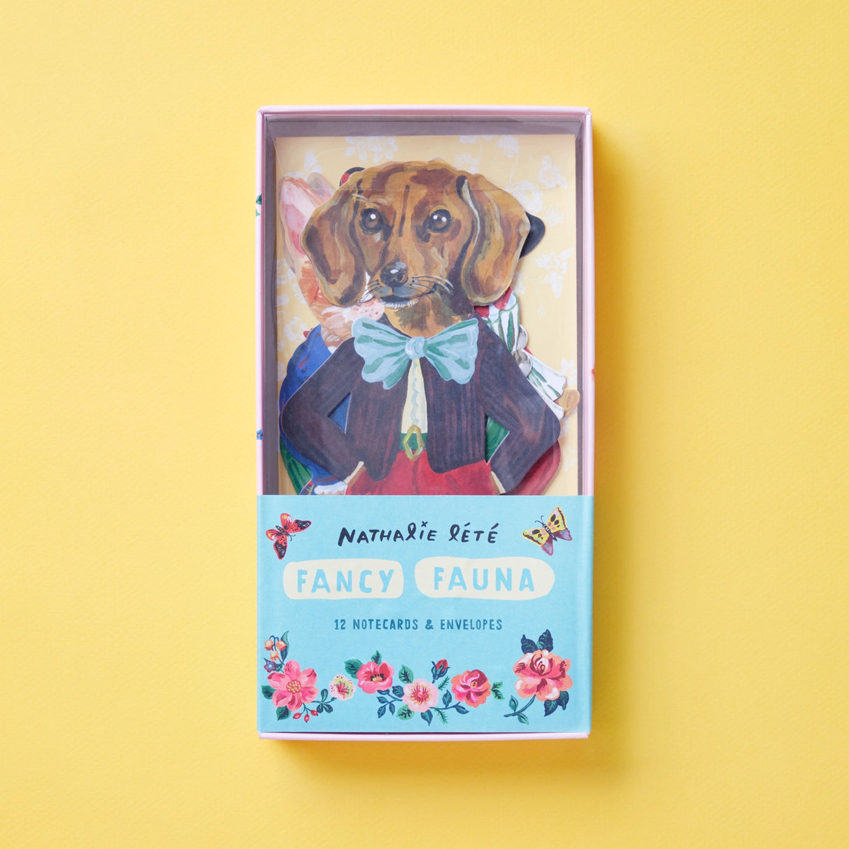 These 12 die-cut cards from Paris-based artist Nathalie Lété are all dressed up and ready to go! Featuring delightful paintings of dapper dogs and cute cats bearing gifts and flowers, these cards will suit all fancies—and occasions.&nbsp;

BELOVED FRENCH ARTIST: Nathalie Lété's distinct aesthetic has attracted a strong worldwide following. She works in a variety of mediums, including illustration, painting, ceramics, and textiles. 