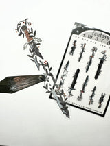 The Fantasy Swords sticker sheet has illustrations by Shelley Couvillion. I paint everything myself in goache! No AI here. This set pairs perfectly with the Swords washi tape as it uses the same illustrations! Perfect for journaling, especially for those of us with a gothy or fantasy or dark academia aesthetic.