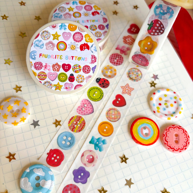 Add some color to your journal and crafts with this cute button themed washi tape designed by Veronica! This washi tape includes buttons hand-painted by Veronica and from her personal collection!

Perfect for crafts, journaling, snail mail, and more.

Size: 15mm x 10m