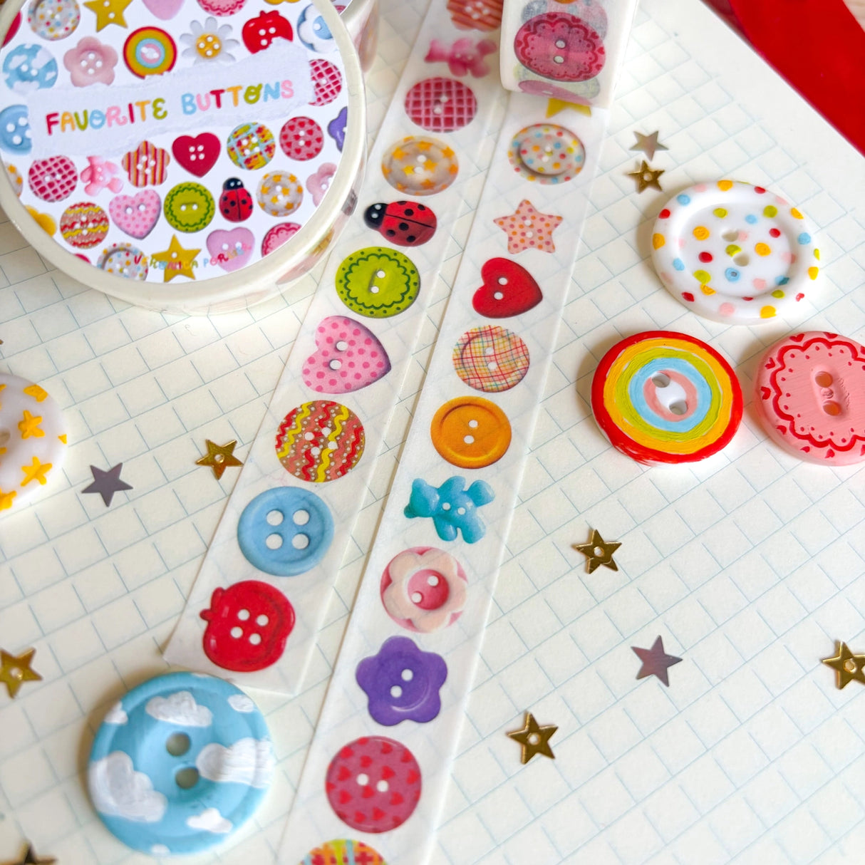 Add some color to your journal and crafts with this cute button themed washi tape designed by Veronica! This washi tape includes buttons hand-painted by Veronica and from her personal collection!

Perfect for crafts, journaling, snail mail, and more.

Size: 15mm x 10m