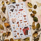 🍄🌿 Wander into a woodland where every fallen log, mossy hollow, and shaded forest floor hides a tiny treasure. From oyster clusters and scarlet caps to intricate morels and velvety violets, this vintage-inspired set celebrates mushrooms as a lovely gathering of curious specimens for anyone enchanted by the wild, mysterious world of the forest floor.

One sticker sheet is included.
Top Coating: None
Adhesive Layer: Paper
Backing Layer: Clear PET
Size: 6.69"x3.54"
Weight-0.03oz