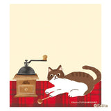 Furukawashiko x Kalinta Memo Pad - Black Coffee Cat playing with a coffee grinder on a plaid background, featuring the brand 'Kalita'.