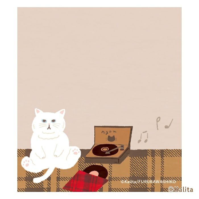 Furukawashiko x Kalinta Memo Pad - Caramel Coffee Illustration of a white cat sitting next to a record player on a plaid rug with a beige background.