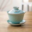 This classic gaiwan teapot is the perfect brewing vessel for many styles of premium teas such as oolong and pu'er&nbsp;

Size: 2" H x 3.25" W x 3.75"D
Capacity: 5oz (150ml)

Material: Porcelain&nbsp;
Origin: China