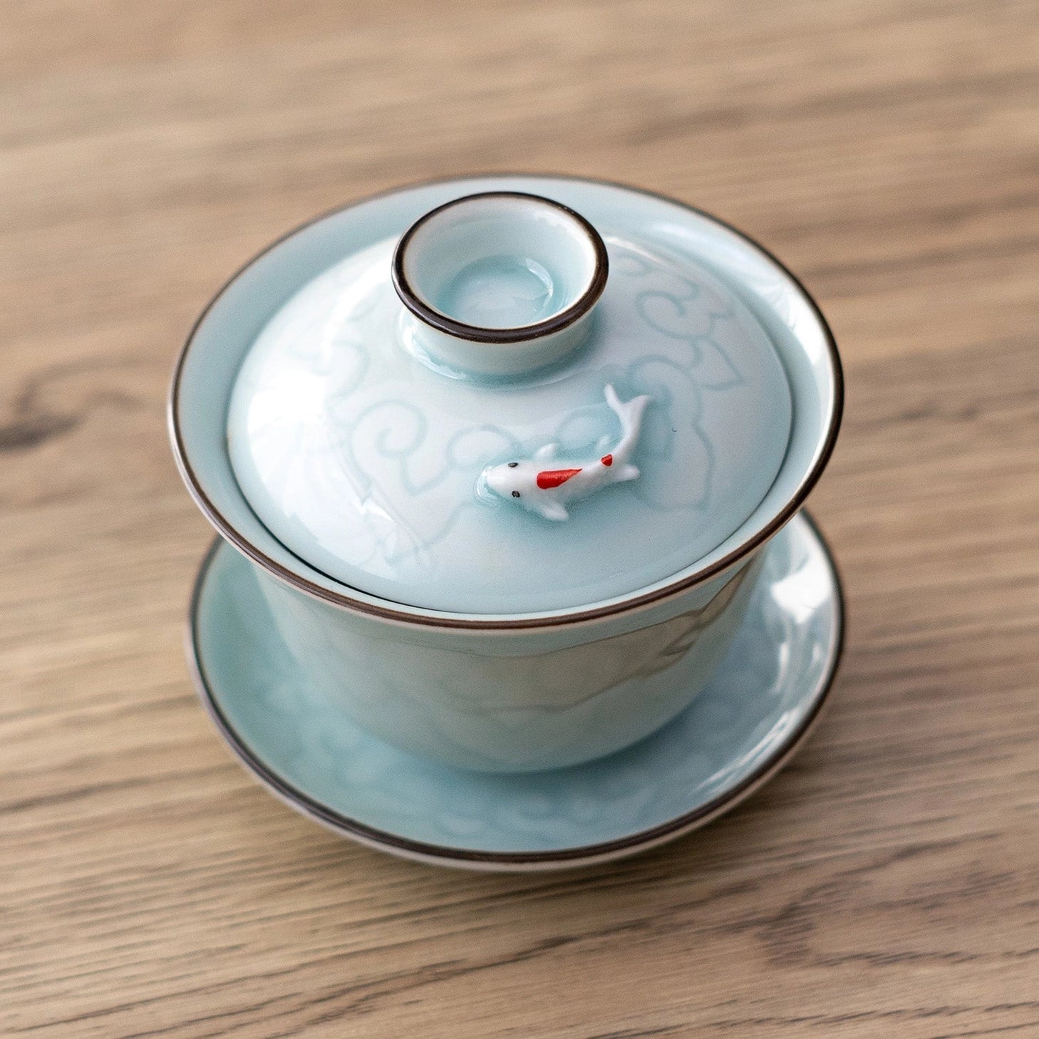 This classic gaiwan teapot is the perfect brewing vessel for many styles of premium teas such as oolong and pu'er&nbsp;

Size: 2" H x 3.25" W x 3.75"D
Capacity: 5oz (150ml)

Material: Porcelain&nbsp;
Origin: China