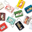 A miniature keychain version of the popular General Purpose Case by nähe. The true-to-original case comes with a clear front pocket with extra inserts inside and out. A ball chain securely attached to the corner of the case lets you hang it onto your keys or bags, perhaps in multiples.

Perfect size to travel with and quickly access your keys, coins, medicine, or small accessories.&nbsp;
