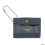 A miniature keychain version of the popular General Purpose Case by nähe. The true-to-original case comes with a clear front pocket with extra inserts inside and out. A ball chain securely attached to the corner of the case lets you hang it onto your keys or bags, perhaps in multiples.

Perfect size to travel with and quickly access your keys, coins, medicine, or small accessories.&nbsp;