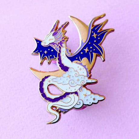 Glitter Punk - Celestial Dragon Enamel Pin

This fabulous starry Celestial Dragon pin is perfect for fans of the mythical!

Made from gold hard enamel, this 48mm purple dragon is surrounded with glittery clouds and a large gold crescent moon. It is secured with two purple heart rubber clasps.