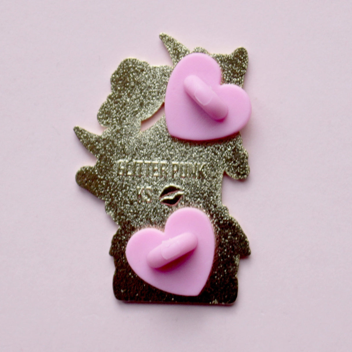 We’ve all sometimes wished we were at home with a hood book, rather than having to deal with the real world! This super cute pin features a black cat sitting on pink &amp; purple books with the slogan ‘I’d rather be reading’. Behind the cat is a large crescent moon and a pair of glittery pastel clouds.

Measurements: 45mm (1.77”)