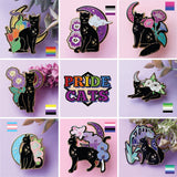 Celebrate your Pride with this fabulous Pansies Cat pin!

It features a black cat in front of a sparkly purple moon, next to some pansies in the black, grey, white & purple colours of the Ace Pride flag.

Each pin has a pair of heart shaped rubber pin backs, and is presented on a Pride themed Glitter Punk backing card. This pin is part of my Pride Cats collection, a 10-part set of enamel pins celebrating pride!

Measurements: 39mm (1.53”)