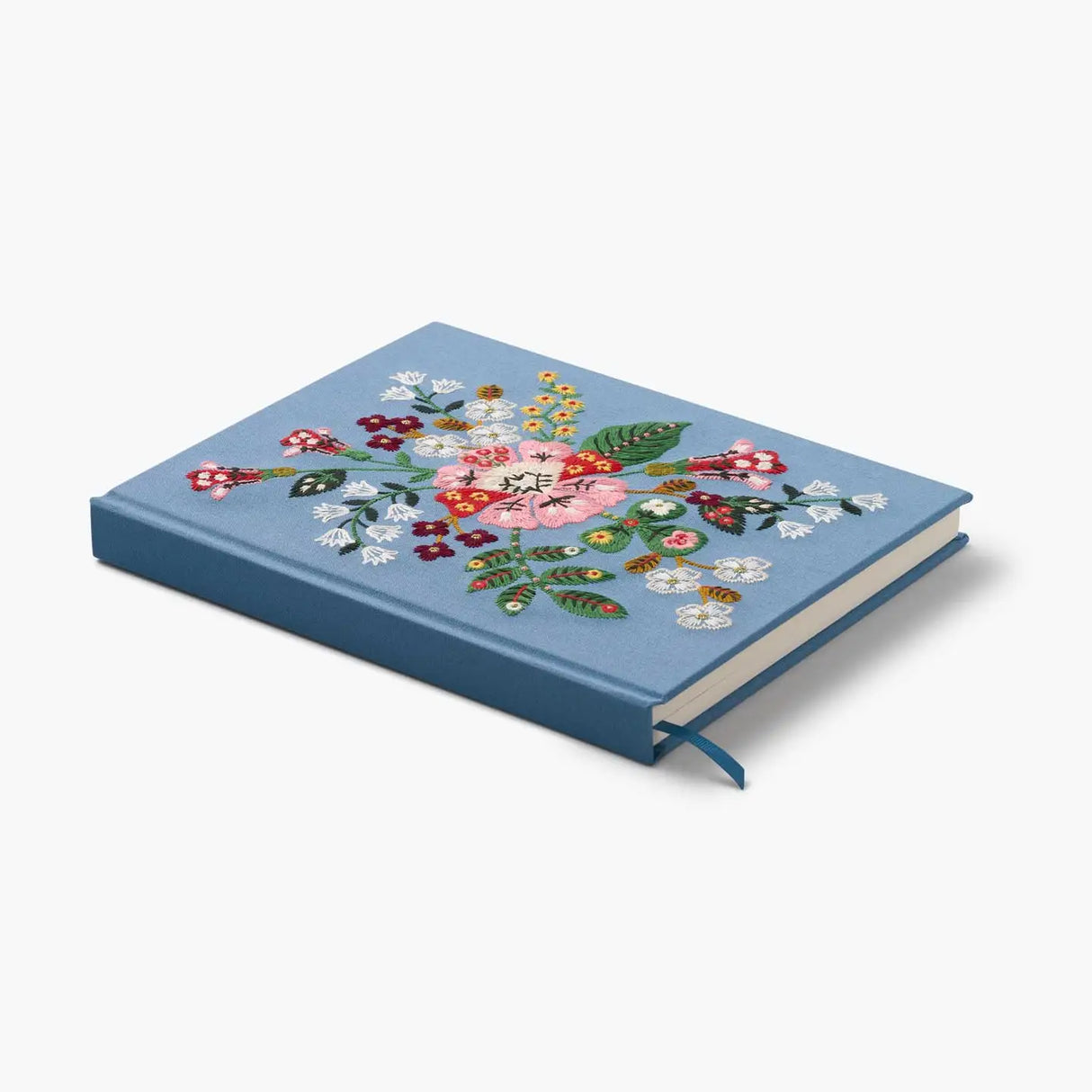 Our embroidered sketchbook is a large, hardcover journal with 108 unlined pages, perfect for sketching, drawing, and journaling. The cover is wrapped in blue book cloth and embroidered with our Gracie florals. Inside, an attached grosgrain ribbon bookmark will save your place.