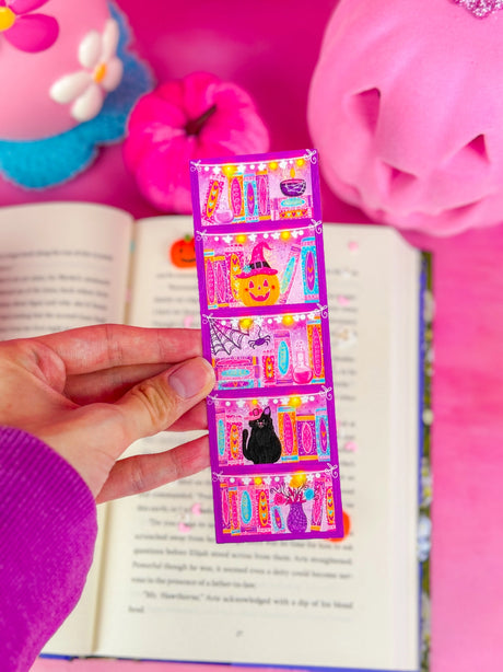 The design for this bookmark was illustrated by me and inspired by my love for books! The illustration is then professionally printed and made into this cute bookmark. The bookmark size is 2" x 6", it is printed on heavyweight 110lb matte card stock, laminated, and is single sided.
