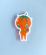 "Baby Tomato" Vinyl Sticker made from Hannakin illustration.

Made from a durable waterproof vinyl with a matte laminate that protects it from scratching, rain and sunlight.

Sticker measures 40mm x 60mm