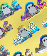 "Noodles" Vinyl Sticker made from Hannakin illustration with holographic accents (background) and shiny gloss finish.

Made from a durable waterproof vinyl with a matte laminate that protects it from scratching, rain and sunlight.