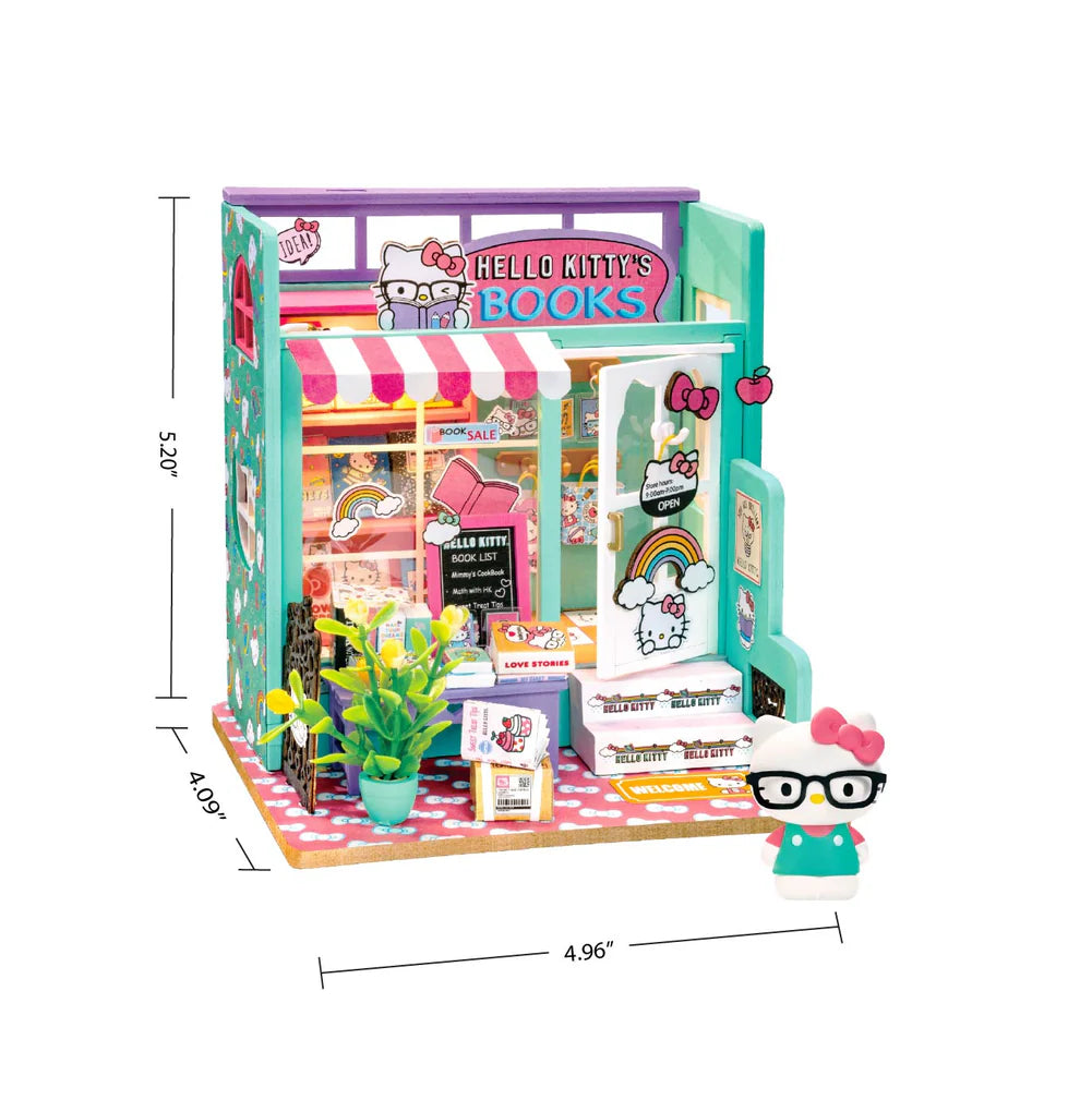 Step into the charming world of Hello Kitty with this delightful miniature house kit, where she runs her very own bookstore. Filled with tiny books, adorable gifts, and colorful gift bags, this kit is decorated in Hello Kitty's iconic style. The charming "open" sign welcomes you into the cozy shop, where a little lamp lights up the interior, creating a warm and inviting atmosphere. Perfect for fans and crafters alike, this kit offers hours of fun and a beautiful keepsake to treasure.