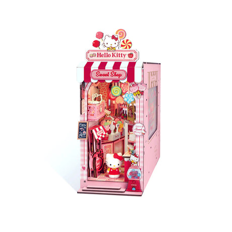 Step into a sugary dream with this irresistibly charming book nook kit, featuring Hello Kitty herself in a candy shop that's overflowing with sweetness and delight! From candy jars lining the shelves to pastel goodies peeking out from every corner, this magical miniature world is bursting with adorable, mouthwatering details.
And the showstopper? A dazzling lollipop chandelier that hangs like a crown jewel above the shop, casting a whimsical glow over the entire scene. It's a heart-melting centerpiece that 