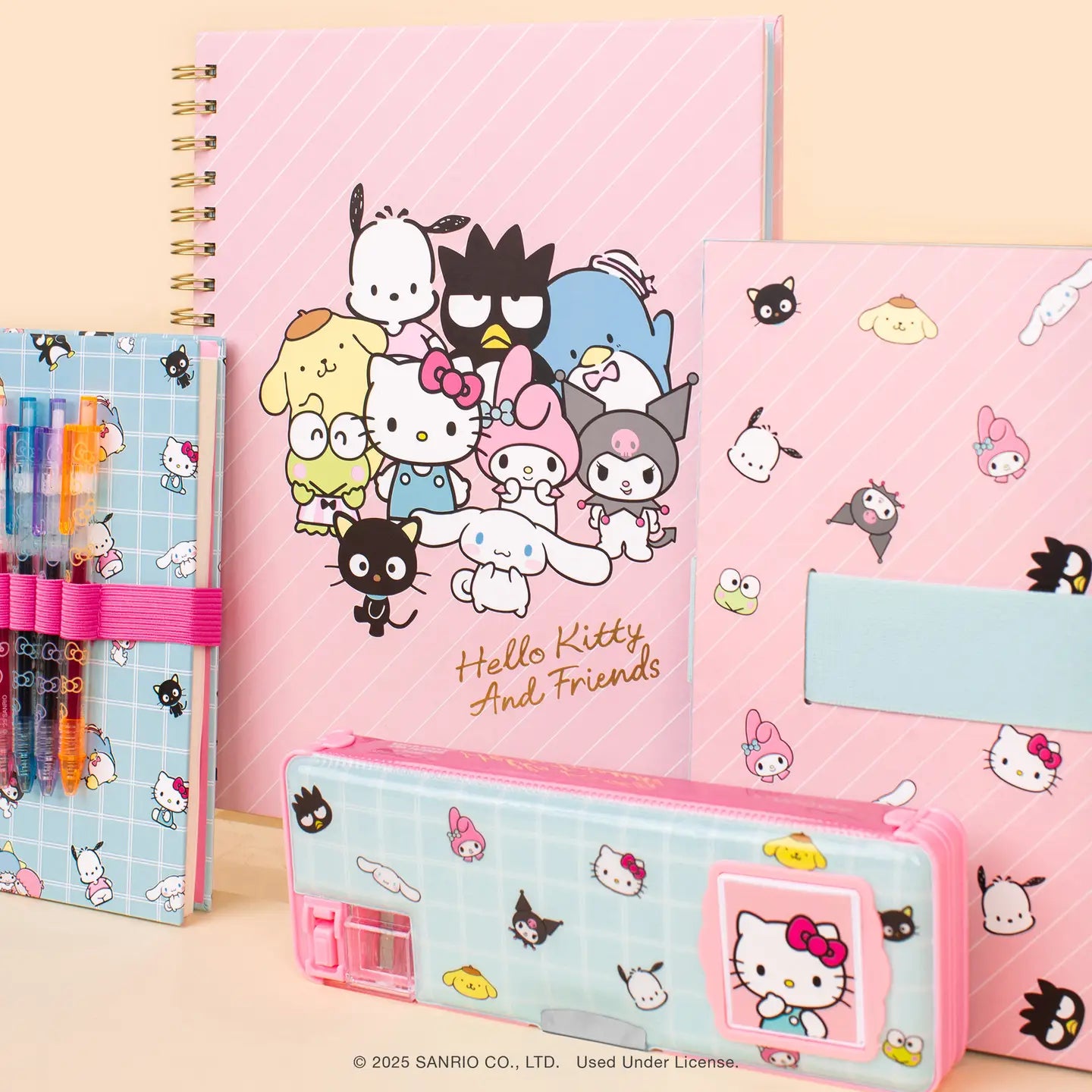 Travel back in time with this multifunctional pencil case, featuring adorable Hello Kitty and Friends artwork. With a built-in calculator, pencil sharpener, and dual compartments for extra storage, this case is as practical as it is cute. Each side holds up to five pens or pencils, plus erasers, paper clips, and more—keeping everything organized and in place with secure magnetic closures. It's the perfect blend of classic charm and everyday function! © 2025 SANRIO CO., LTD. Used Under License.