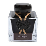 The 1670 Anniversary Collection celebrates the life of the 17th-century French adventurer, Jacques Herbin. Sailing from India, Monsieur Herbin arrived home to Paris with formulas for the now-famous Herbin inks and sealing waxes.

Enhanced with a luxurious, golden metallic sheen, these highly saturated inks will add an elegant luster to all your writing.&nbsp;

The intense brown of Caroube ink is streaked with fire-coloured reflections (gold flakes) to give a sparkle to the various writings.

Hand bottled wi