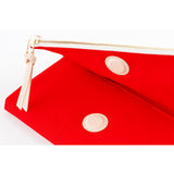 The cover closes with a hidden magnet, which is padded with a leather patch for a softer touch. The outer pocket also features a leather zipper pull.
