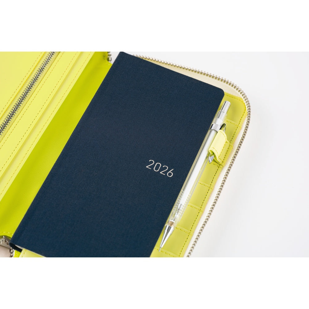 The cover interior is in a vivid yellow. The pen hook is designed to hold a pen by its clip.