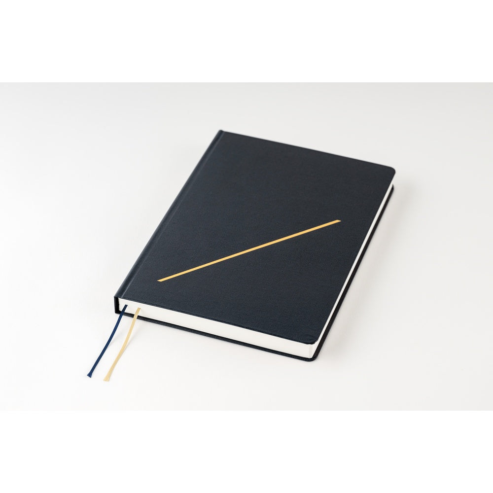 Hobonichi HON 2026 Slash (Navy) [ENG/A5/Jan Start] HON Black notebook with a gold accent on a white background