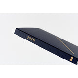 Hobonichi HON 2026 Slash (Navy) [ENG/A5/Jan Start] HON Black planner with '2026' printed on a white background
