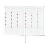 Hobonichi HON 2026 Slash (Navy) [ENG/A5/Jan Start] HON Open planner with monthly calendar layout on a white background