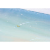 In the sky, a meteor shower flashes across the vastness. Within it, there is a single larger one, which catches the light and shines demurely with its gold foiling.