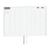 Hobonichi Liberty Fabrics: Sasha Kiora ENG / A5 / Jan Start HON Calendar planner with monthly layout on a white background