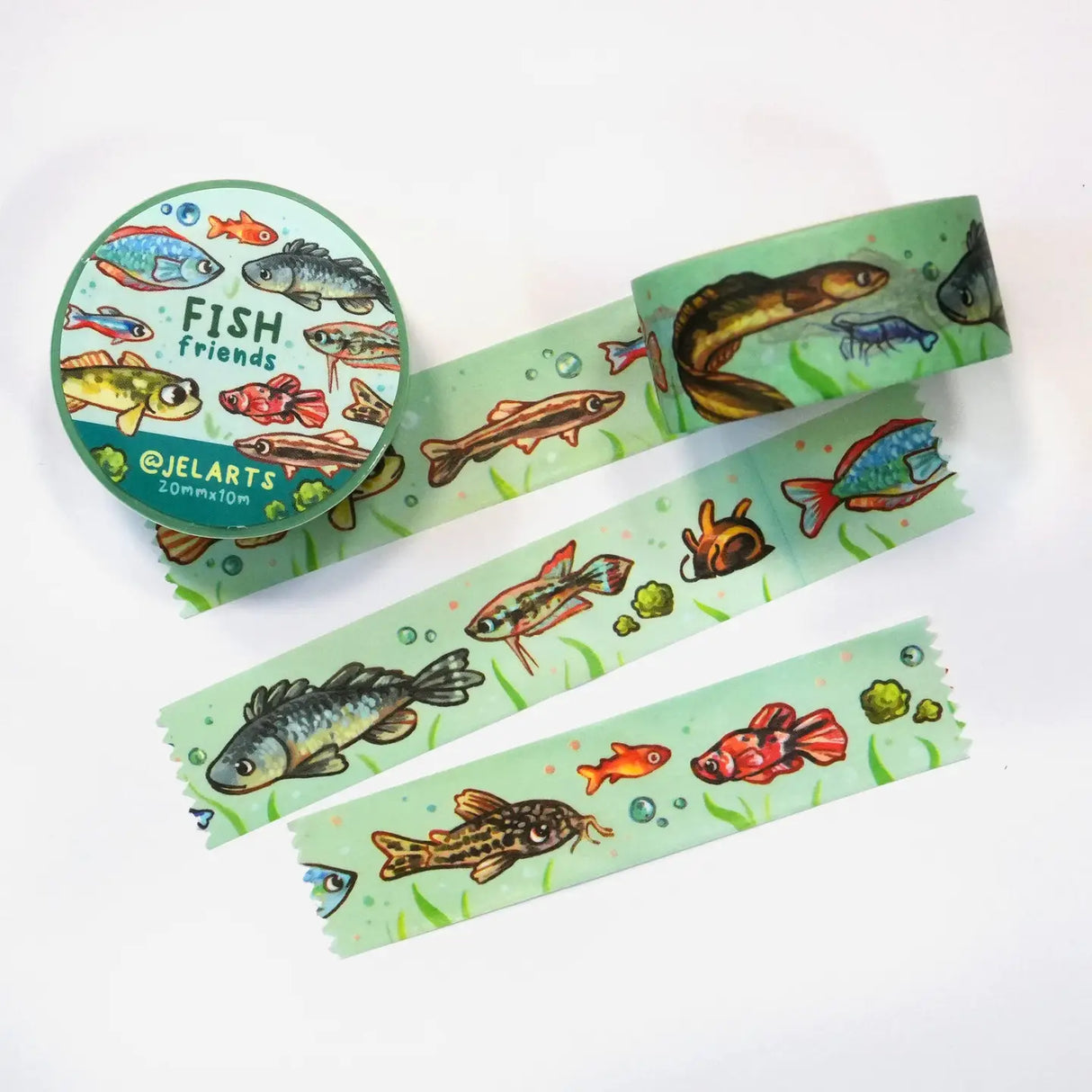 Various cute fish on a roll of washi tape.

20mm wide x 10m length
Great for decorating journal spreads, sketchbooks, scrapbooks, and more!
Plastic wrapped with a label on one side