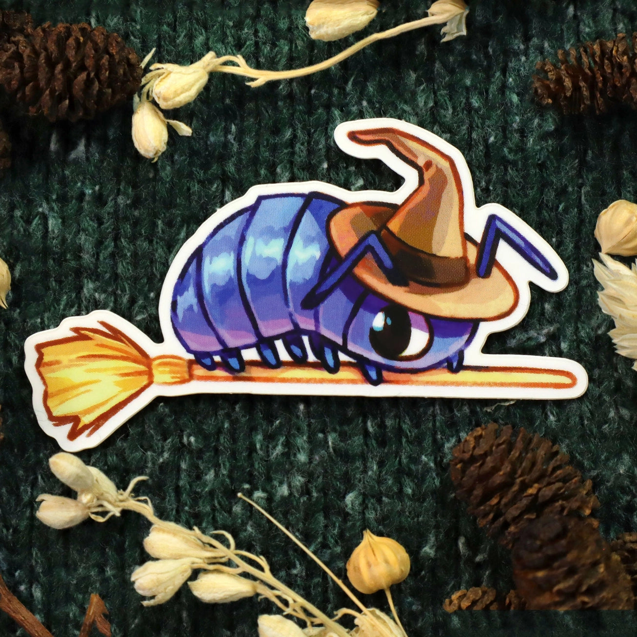 A Roly Poly, Potato Bug, or Pill Bug - but as a witch!

 * Glossy vinyl die cut sticker 2.7" x 1.5" 
 * Durable and waterproof
 * Sold as-is with no extra packaging