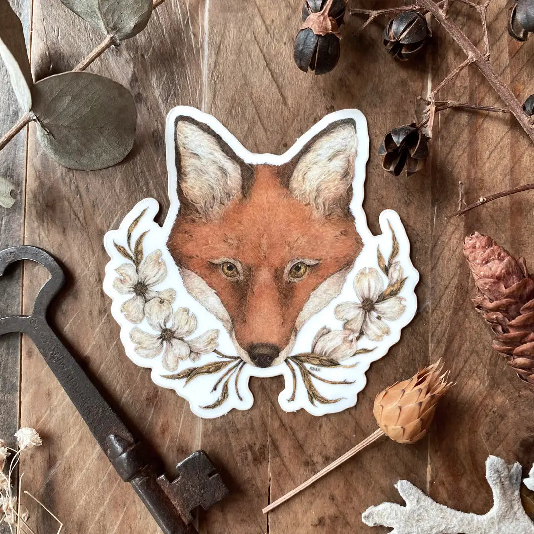 Vinyl semi-transparent sticker of an antique sewing machine and rose, illustrated by Jessica Roux.

The background of the sticker is transparent, but the sewing machine and rose are opaque.

Sticker measures approximately 2.6" x 2.1" and is glossy.