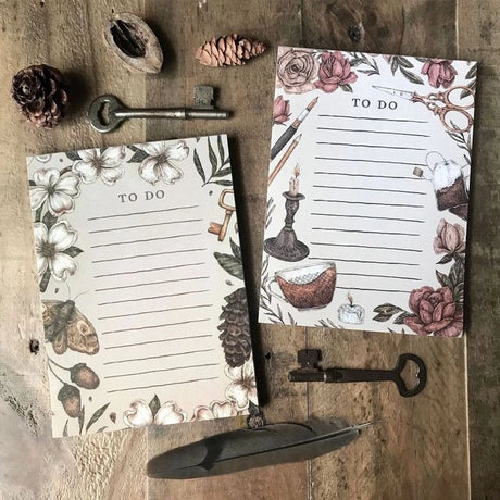 Whimsical, nature-inspired notepads perfect for writing your to do list, grocery list, and more. 50 pages, with full color illustration on the front of every page.

Matte finish perfect for writing.

Packaged in a clear cello sleeve.

Dimensions: 5.5"x4"