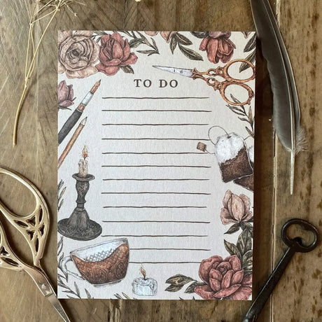 Whimsical, nature-inspired notepads perfect for writing your to do list, grocery list, and more. 50 pages, with full color illustration on the front of every page.

Matte finish perfect for writing.

Packaged in a clear cello sleeve.

Dimensions: 5.5"x4"