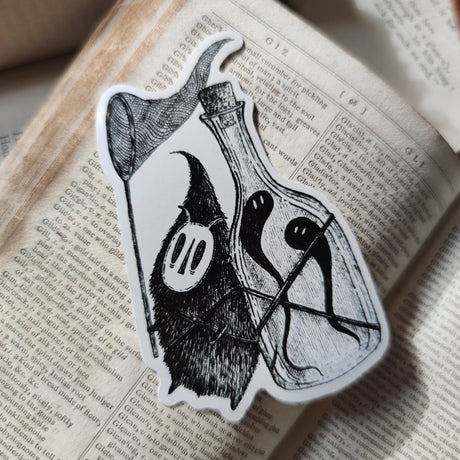 Die-cut vinyl sticker featuring a little bottle-backed ghost hunter, taken from Jon Turner's book Fragments.