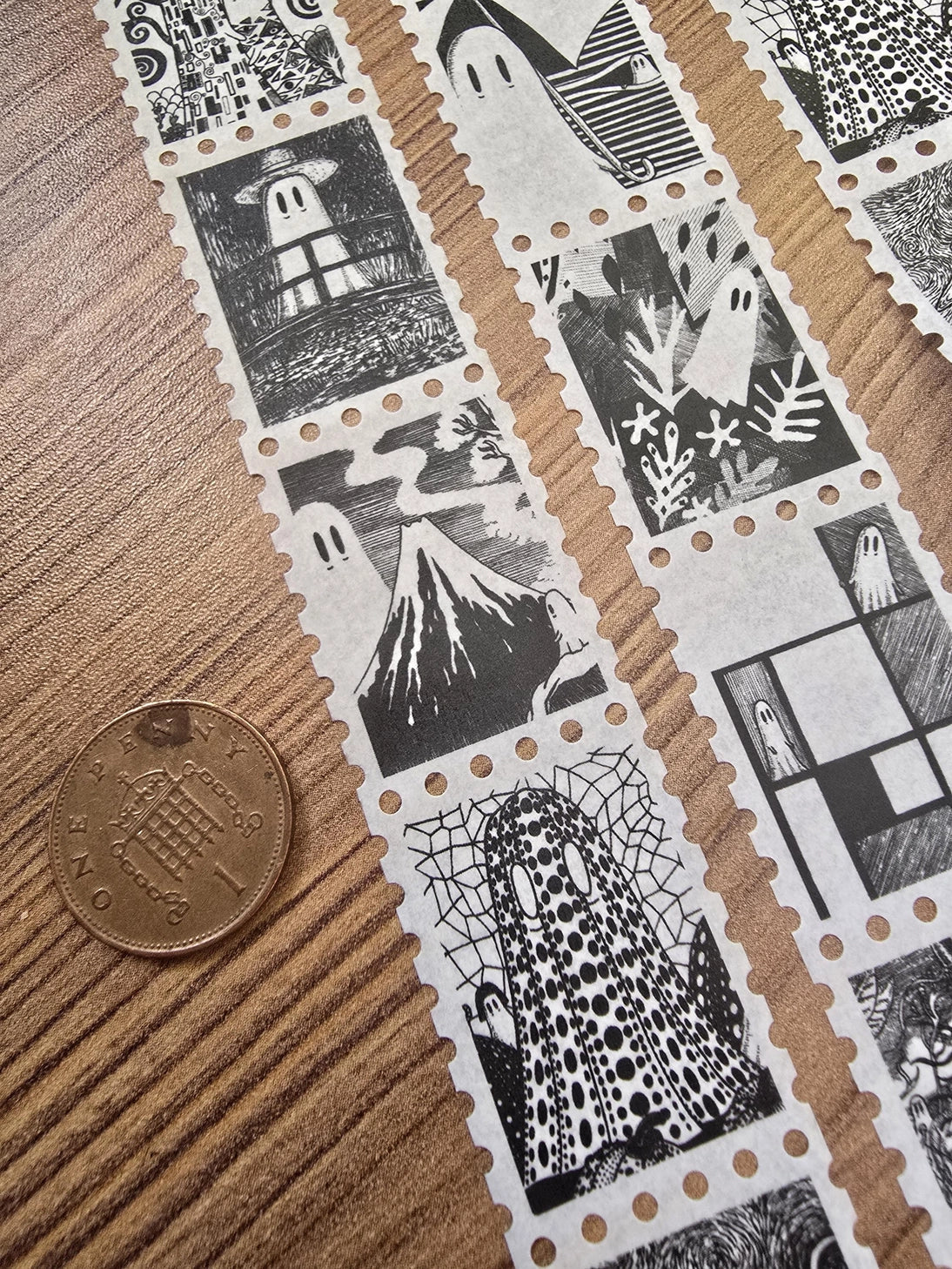 One of two tapes from the Creative Spirits series by Jon Turner, little ghosties taking you on an eclectic tour of art history. This roll features ghosts inspired by Vincent Van Gogh, Frida Kahlo, Piet Mondrian, Claude Monet, Henri Matisse, Hokusai, Malika Favre, Gustav Klimt, Keith Haring, and Yayoi Kusama.

Perforated to look like a roll of postage stamps, this washi tape features a repeating pattern of ten designs in portrait format from hand-drawn pen and ink artwork, recreated in incredible detail at m