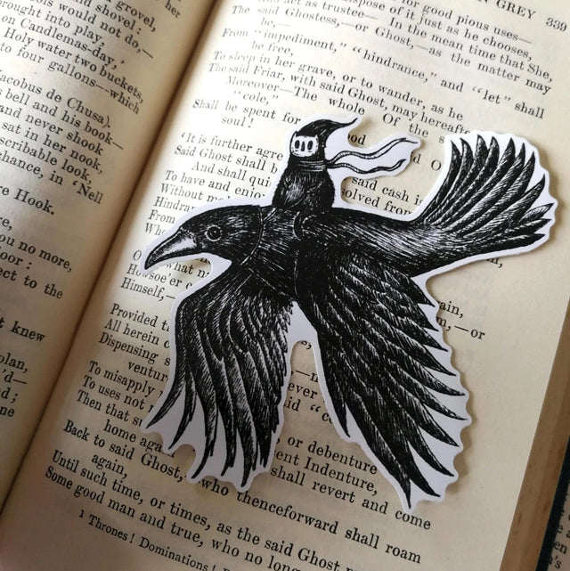 A sticker featuring a little spirit soaring high on the back of a crow, from original pen and ink artwork by Jon Turner.

Die-cut vinyl sticker, suitable for interior or exterior use. Measures approximately 9.5cm (3.75 inches) diameter. Supplied unpackaged