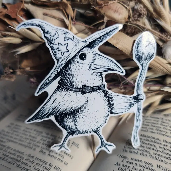 Sticker featuring a wizard bird with a magical egg staff, from my original pen and ink artwork.

Die-cut vinyl sticker, suitable for interior or exterior use. A sticker featuring a little spirit soaring high on the back of a crow, from original pen and ink artwork by Jon Turner.