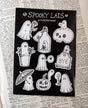 A collection of nine mini ghosts being spooky but generally wholesome, from original ink artwork by Jon Turner.

On an A6 (105x148mm) sized vinyl sheet.

Each sticker is kiss cut for easy peeling and sticking to your laptop, phone, lunchbox, notebook or any other surface you feel needs a bit of spookification.