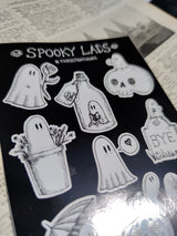 A collection of nine mini ghosts being spooky but generally wholesome, from original ink artwork by Jon Turner.

On an A6 (105x148mm) sized vinyl sheet.

Each sticker is kiss cut for easy peeling and sticking to your laptop, phone, lunchbox, notebook or any other surface you feel needs a bit of spookification.