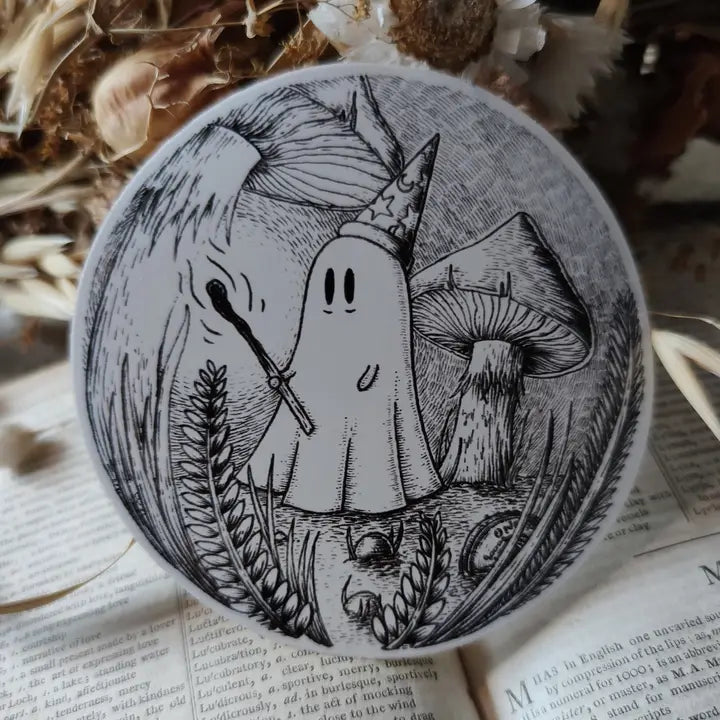 A little magical ghostie, printed on a sticker to add some spooky charm to your laptop, water bottle, or any other surface. From my original pen and ink artwork.

Die-cut vinyl sticker, suitable for interior or exterior use. Measures approximately 76mm (3 inches) across.