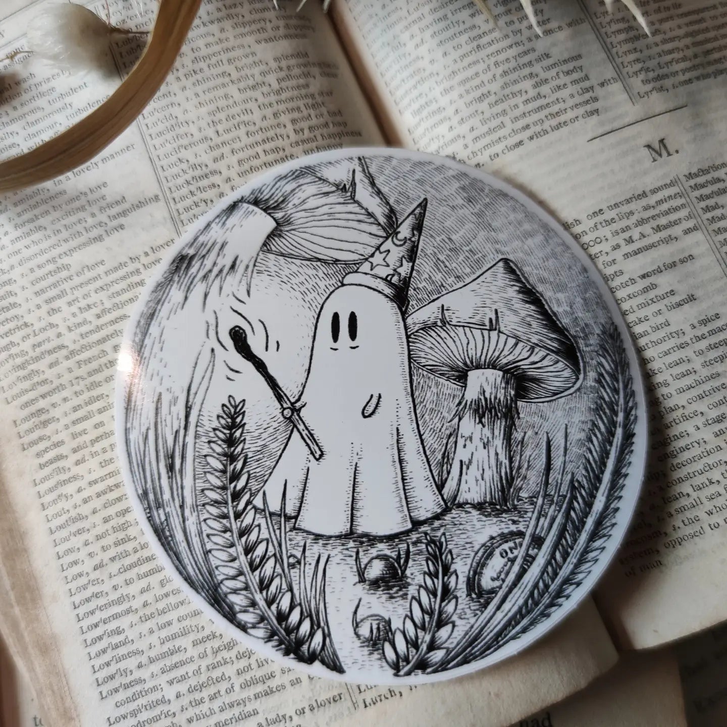 A little magical ghostie, printed on a sticker to add some spooky charm to your laptop, water bottle, or any other surface. From my original pen and ink artwork.

Die-cut vinyl sticker, suitable for interior or exterior use. Measures approximately 76mm (3 inches) across.