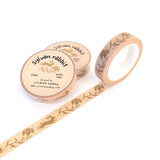 This narrow washi tape features a charming design of swift rabbits and dianthus flowers