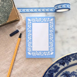 A simple tear away notepad for jotting down to do lists, things to remember, or a short Thank-You note. Illustrated with a pattern of birds, vines, and flowers.