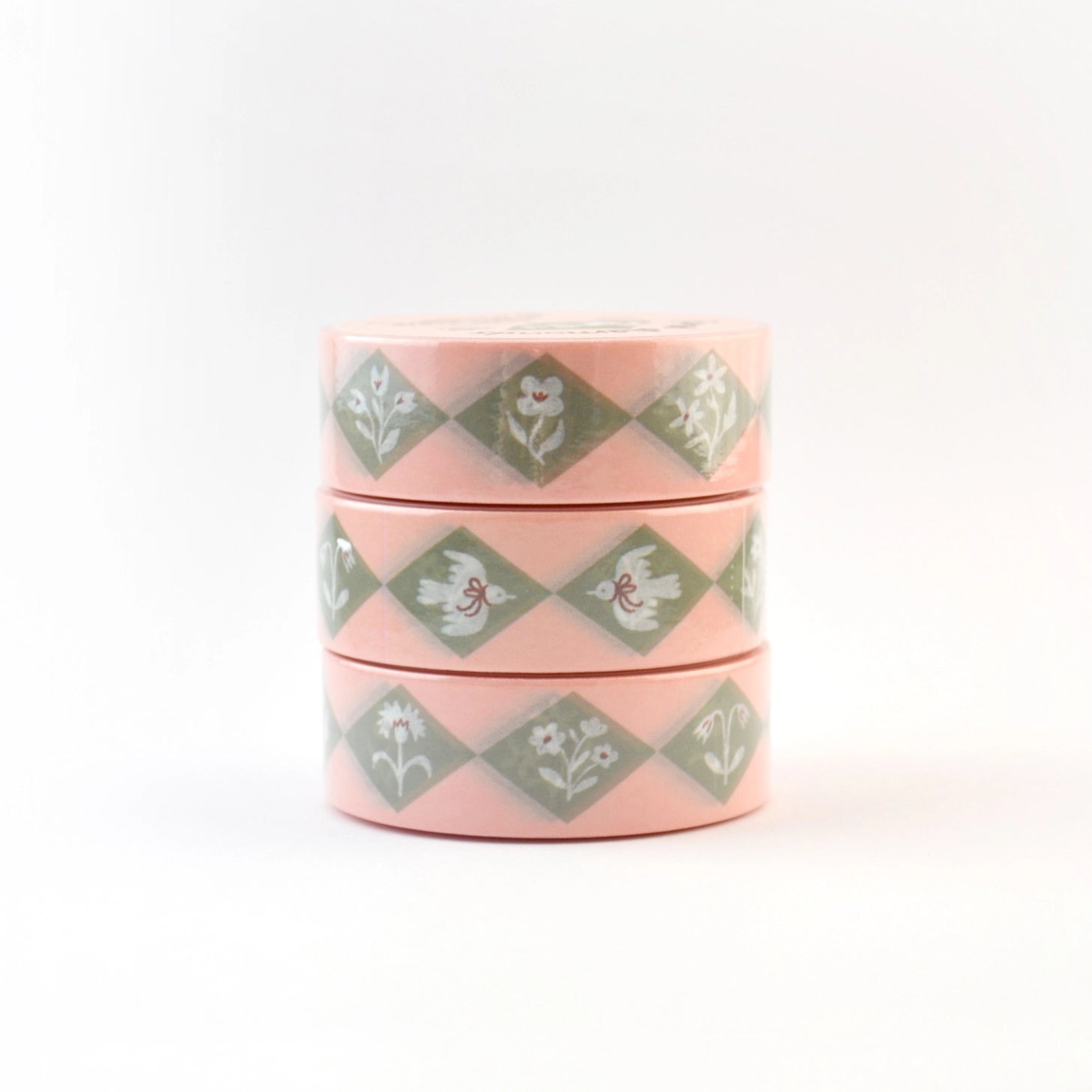 This delightful washi tape features a design of diamonds inset with different flowers and charming flying birds with bows