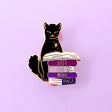 Speed reading, drooping eyes, a growing awareness you should have been in bed hours ago – avid readers everywhere will recognise the call of ‘Just One More Page…!’ 

This super cute 38mm hard gold enamel pin features a black cat reading a pile of purple books – perfect for bookworms everywhere!

Measurements: 38mm 