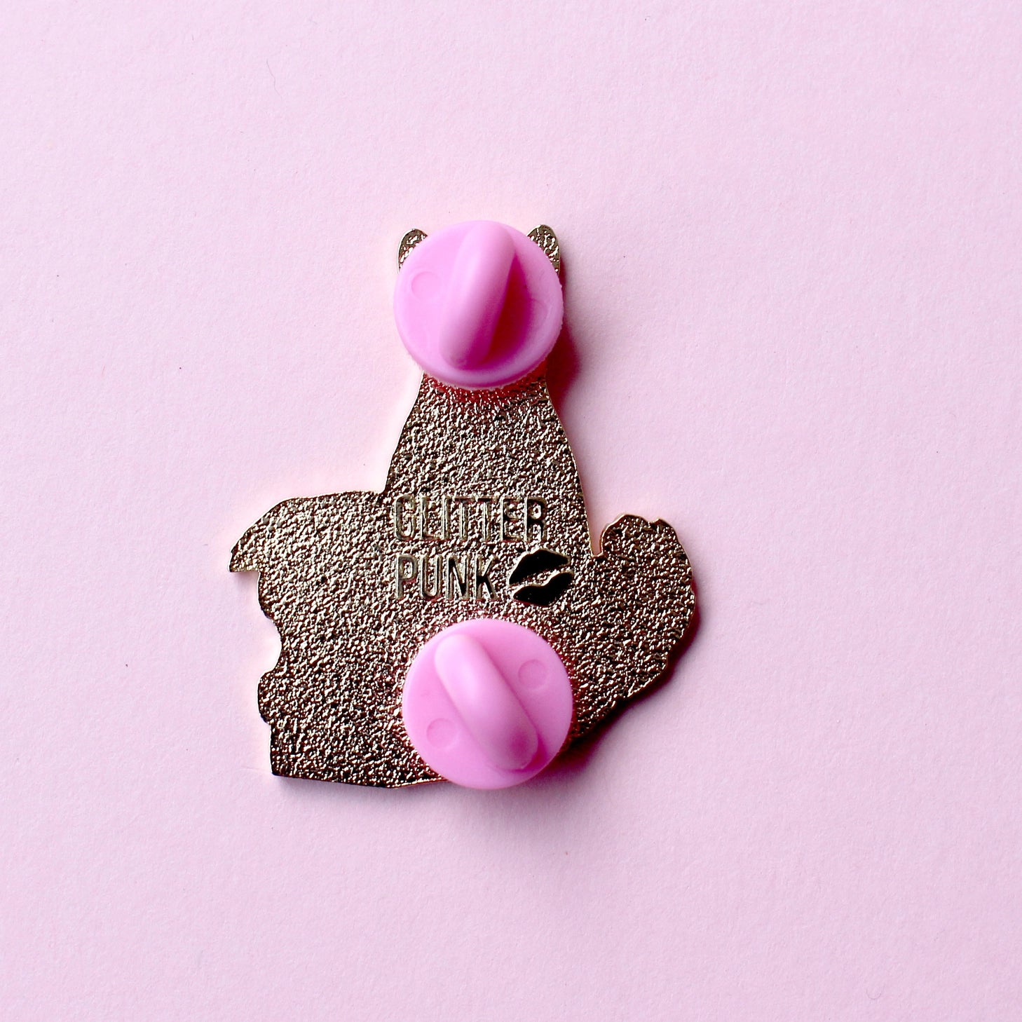 Speed reading, drooping eyes, a growing awareness you should have been in bed hours ago – avid readers everywhere will recognise the call of ‘Just One More Page…!’ 

This super cute 38mm hard gold enamel pin features a black cat reading a pile of purple books – perfect for bookworms everywhere!

Measurements: 38mm 