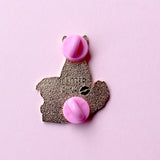 Speed reading, drooping eyes, a growing awareness you should have been in bed hours ago – avid readers everywhere will recognise the call of ‘Just One More Page…!’ 

This super cute 38mm hard gold enamel pin features a black cat reading a pile of purple books – perfect for bookworms everywhere!

Measurements: 38mm 