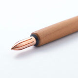 The copper nib was born from a desire for a durable and practical dip pen nib. Enjoy a variety of line widths from fine to broad by tilting the nib at different angles. Fits most nib holders as well as those from our range.

The nib was designed by Yuto Yamazaki of Kuramae-based design studio Alloy. The nib tip has been rounded and polished with meticulous care, providing a remarkably smooth writing experience that defies expectation. Perfected over many iterations, the innovative nib is like no other.

Abo